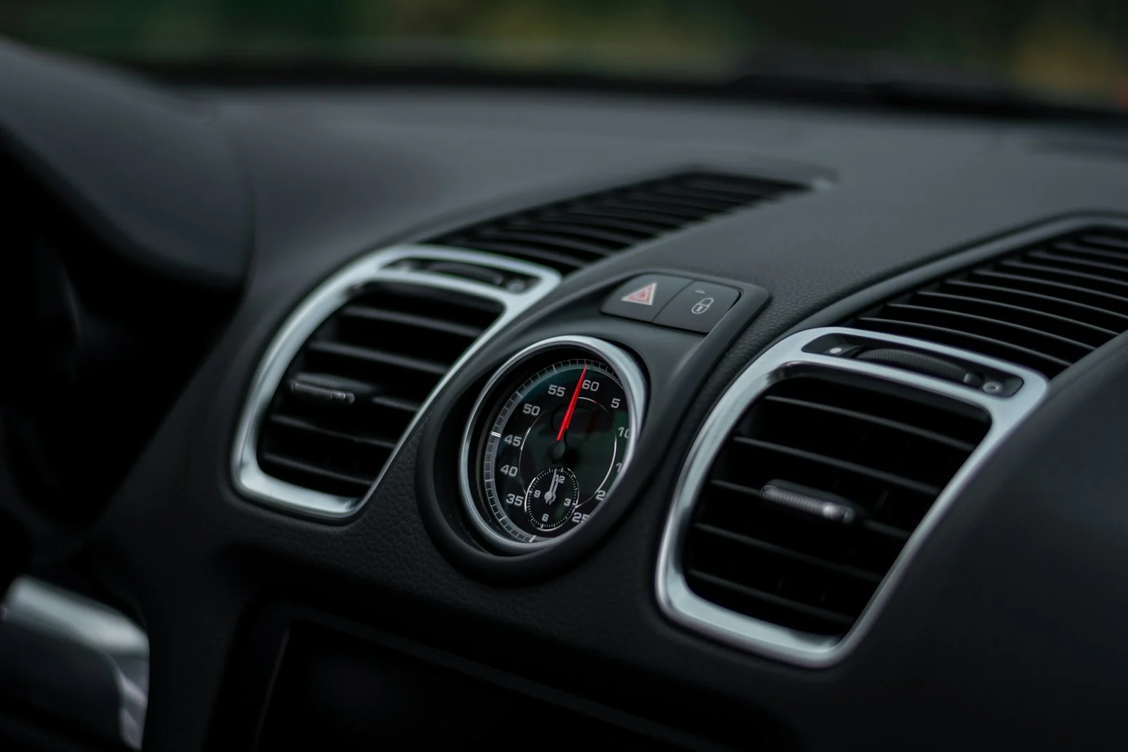 silver and black car air vent